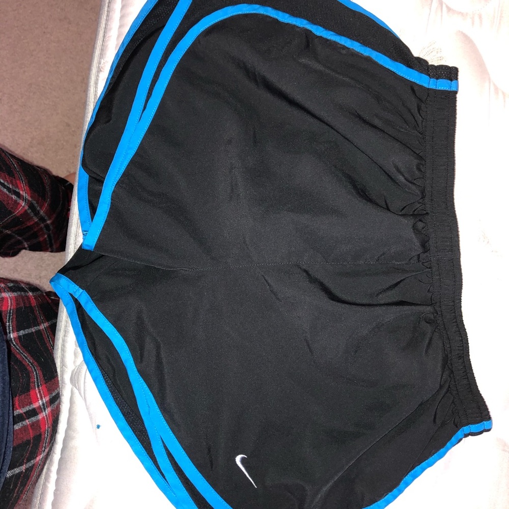 Blue and black Nike shorts